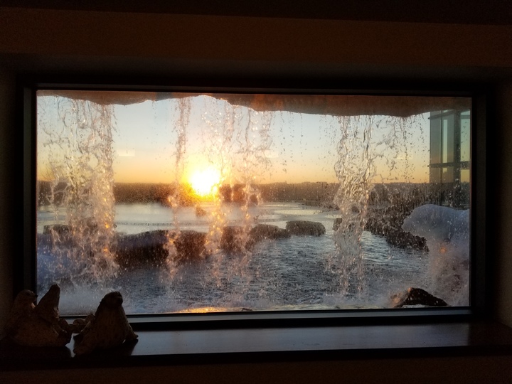 Sunset from behind the waterfall